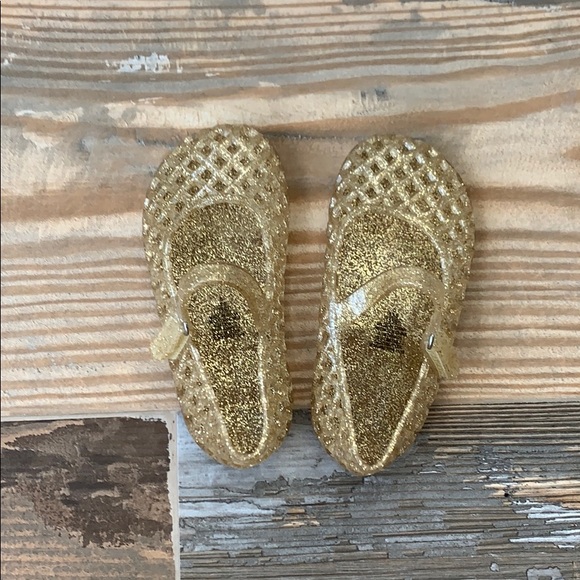 gold jelly shoes